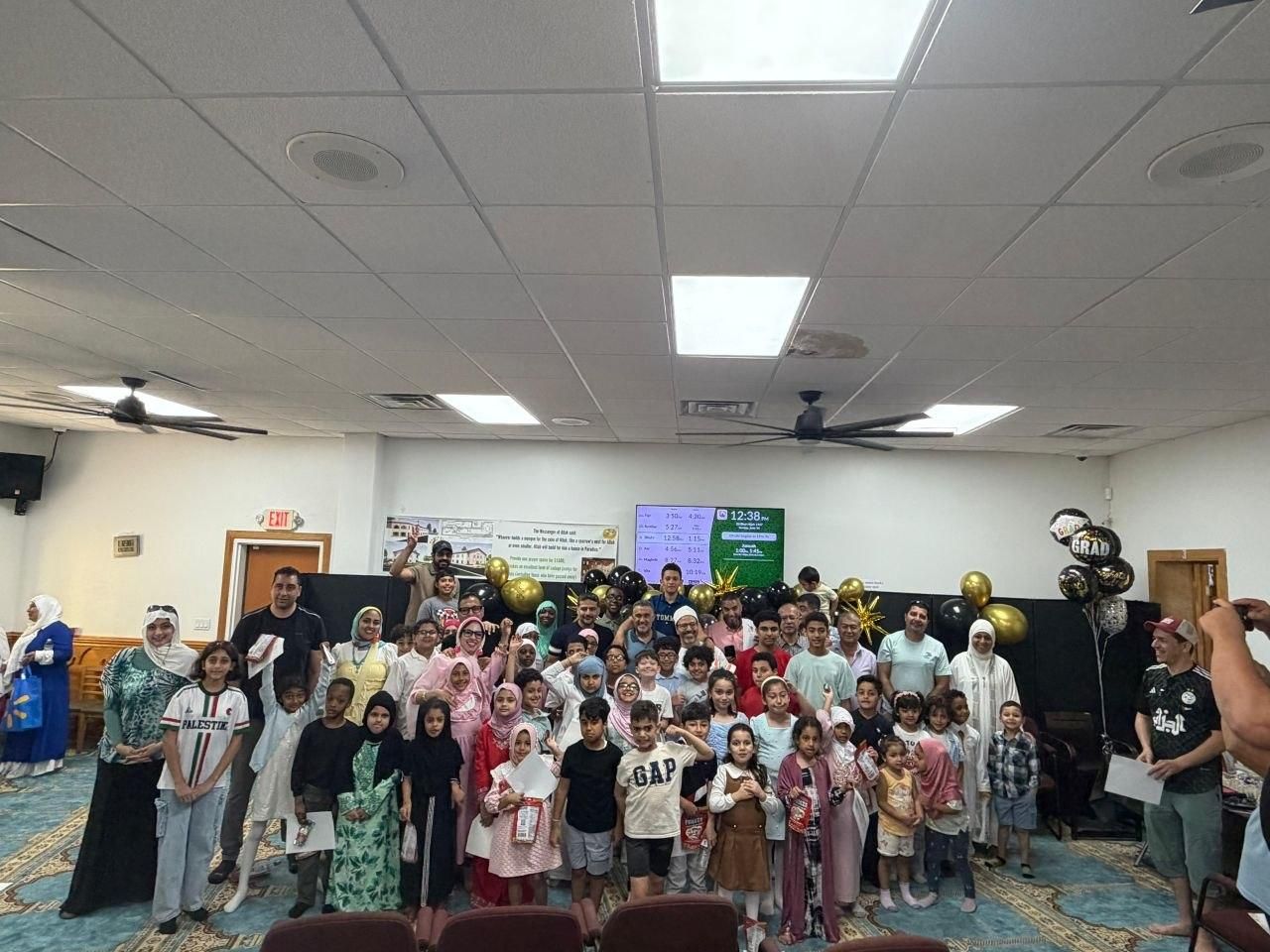 Students, teachers and families gathered together for a celebration at Bilal Academy