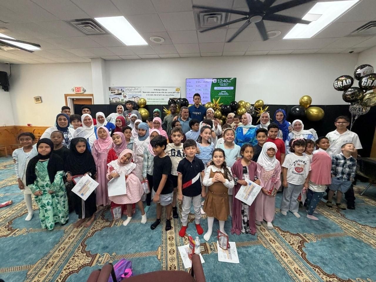 Students, teachers and families gathered together for a celebration at Bilal Academy